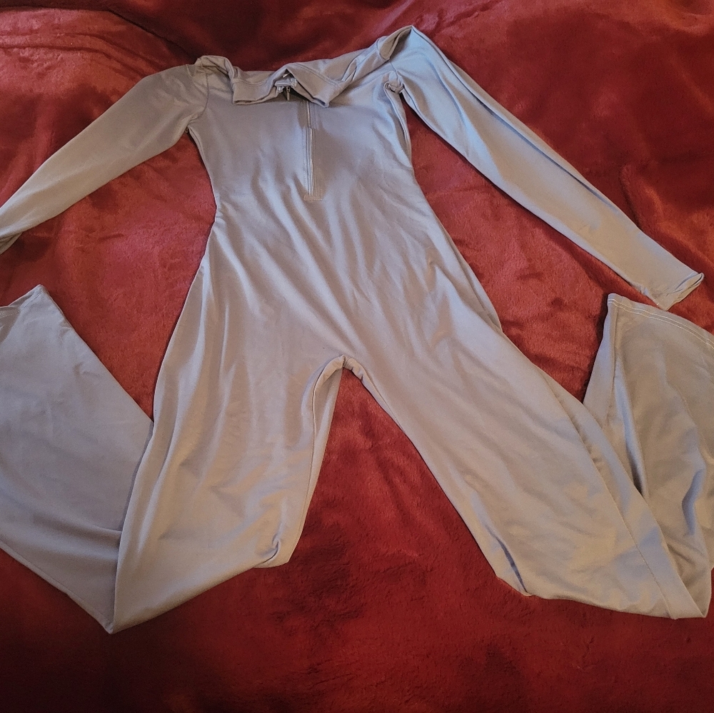 Sky blue women jumpsuit with flair legs.